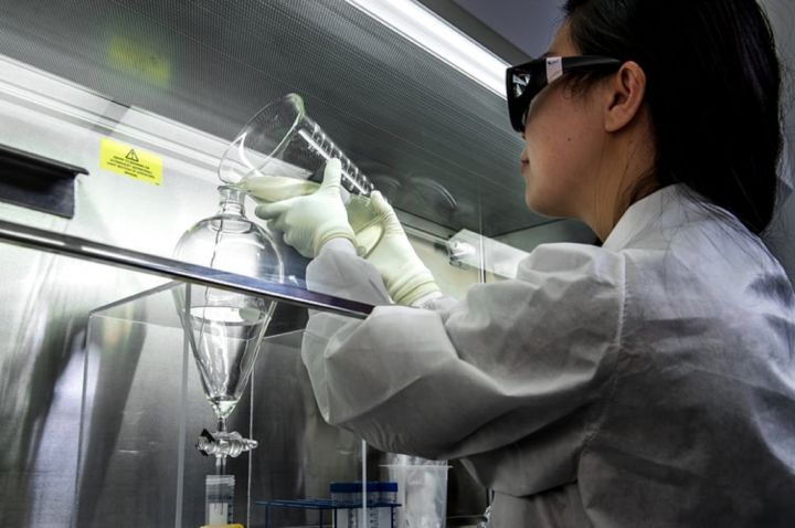 Scientist measuring liquids