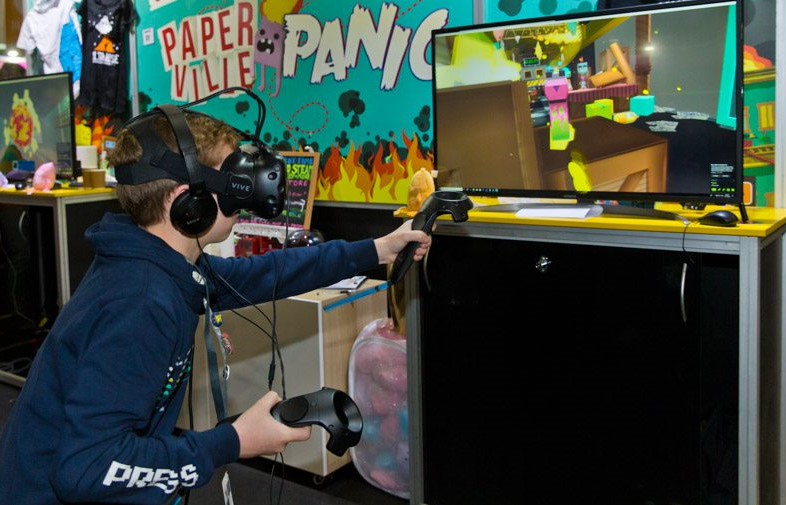 Photo of child playing interactive digital games