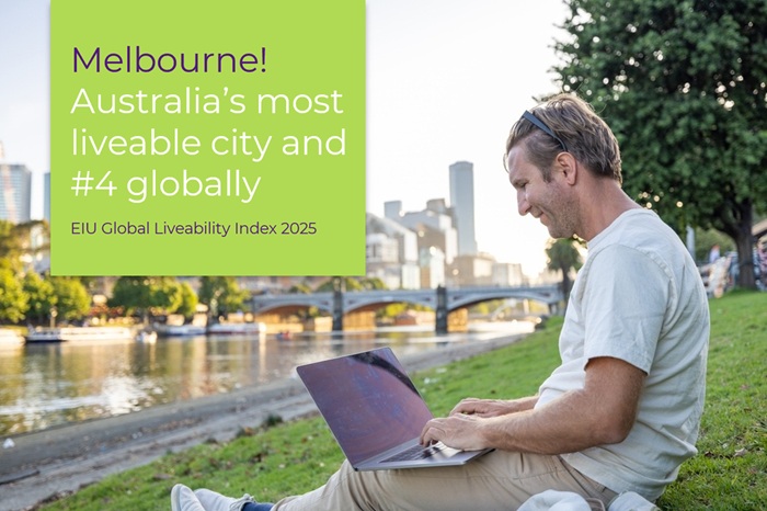 Man working on laptop outdoors in Melbourne CBD 