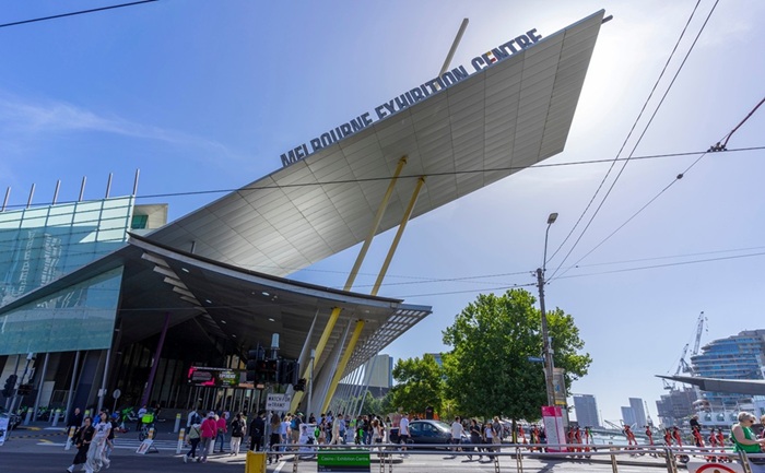 People attending Melbourne Convention and Exhibition Centre in Melbourne, Australia