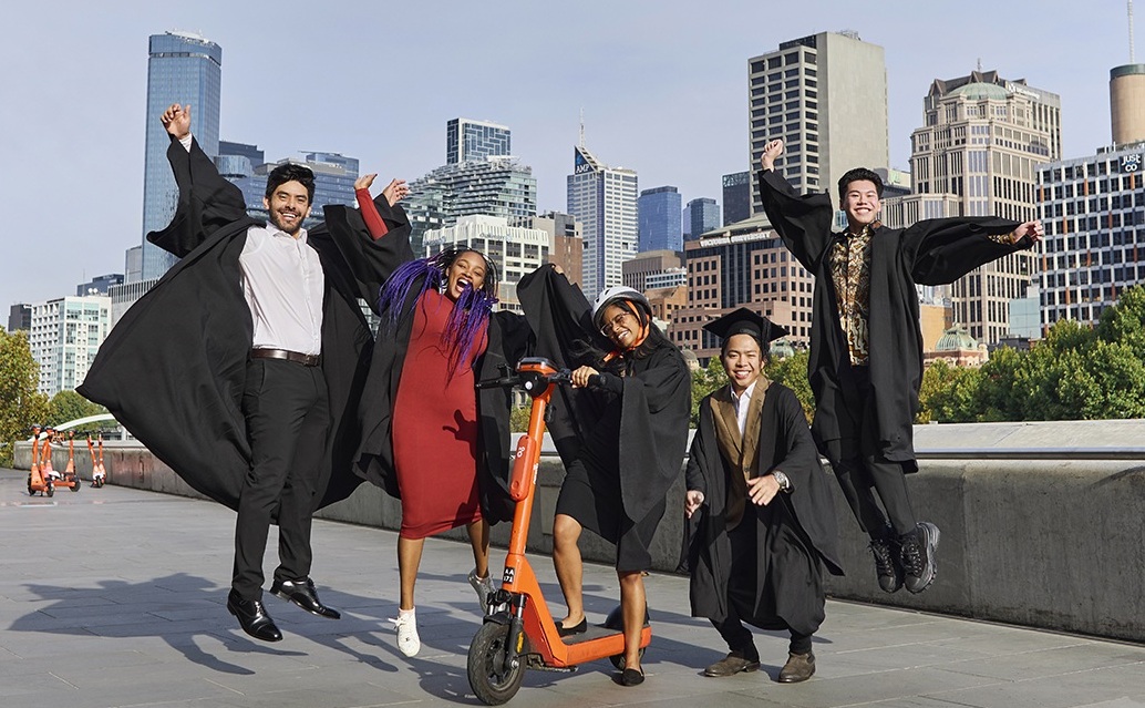 International students celebrate higher education graduation on Southbank, Melbourne